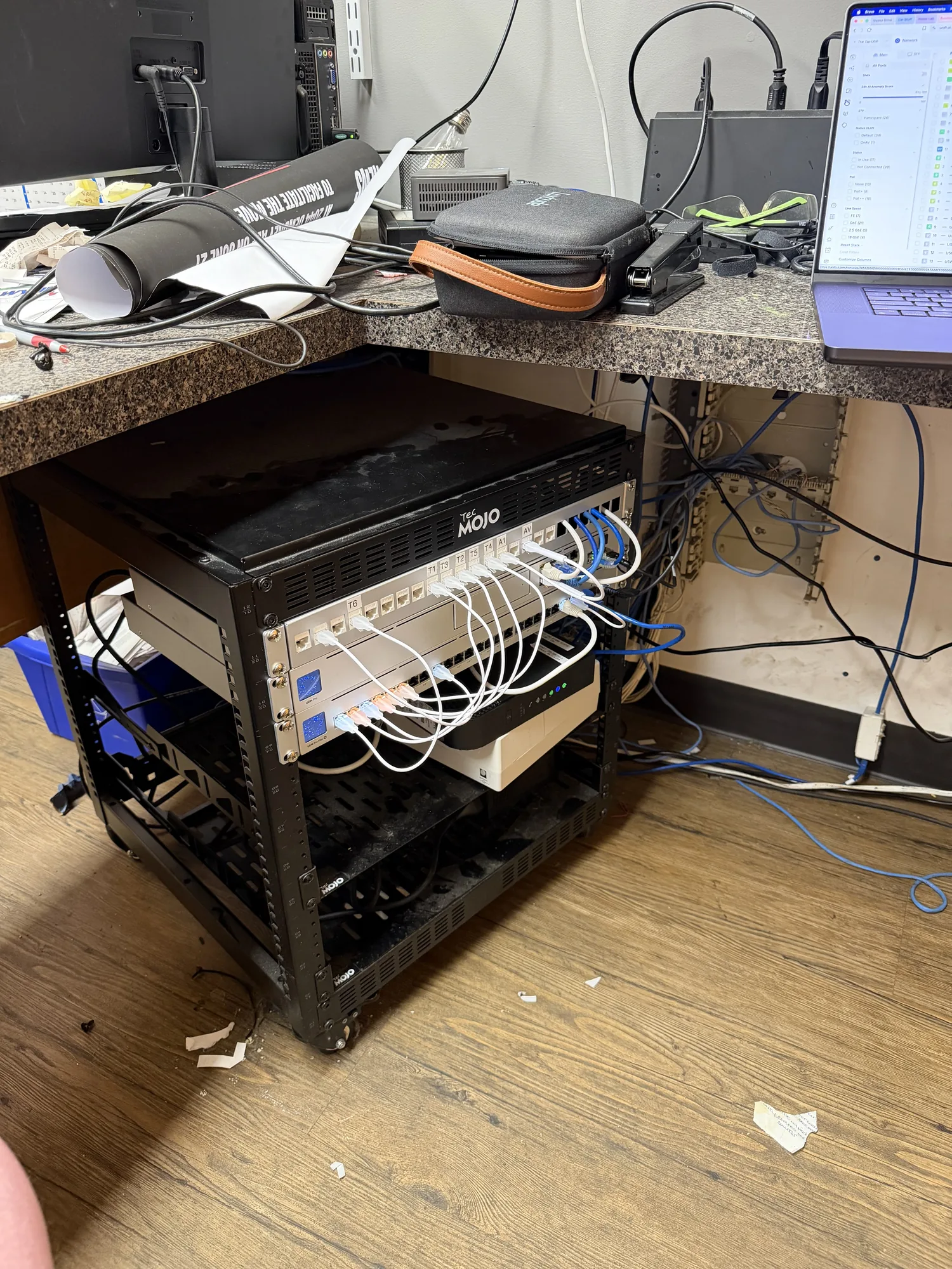 Games rack during setup with laptop configuring the network